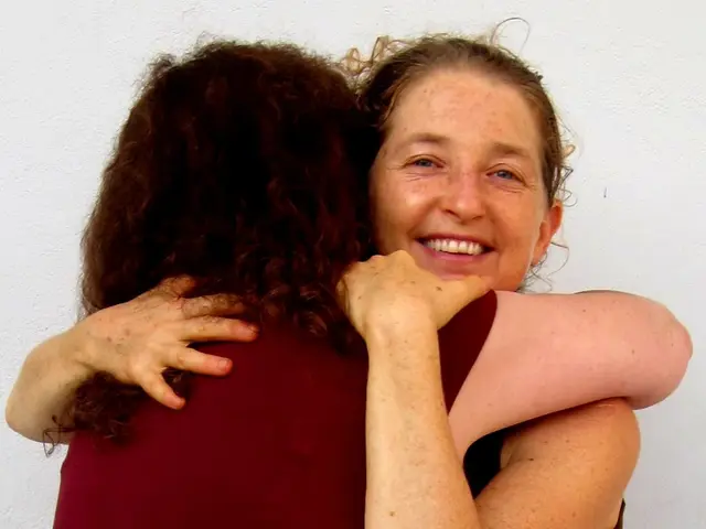 Long-term impacts of regularly embracing coworkers on career advancement