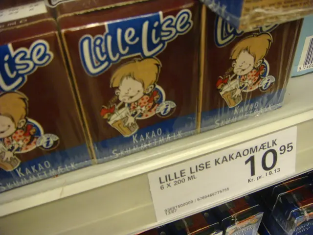 In this image there are some food items arranged in the rack and there is a label with some text on...